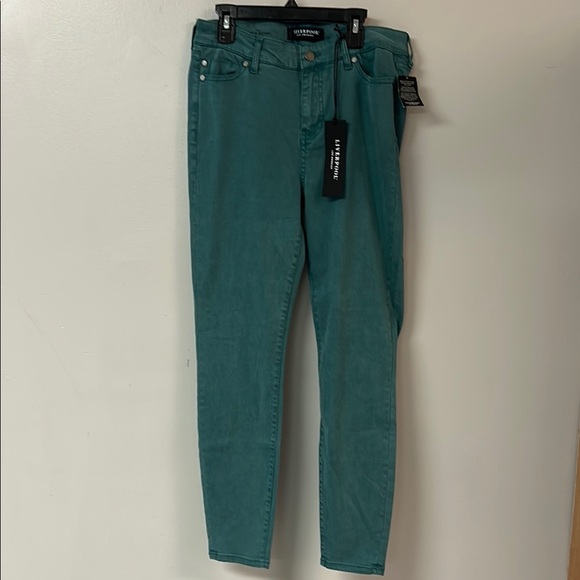 Green Skinny Jeans with Tapered Fit and Contrast Stitching - Picture 1 of 7